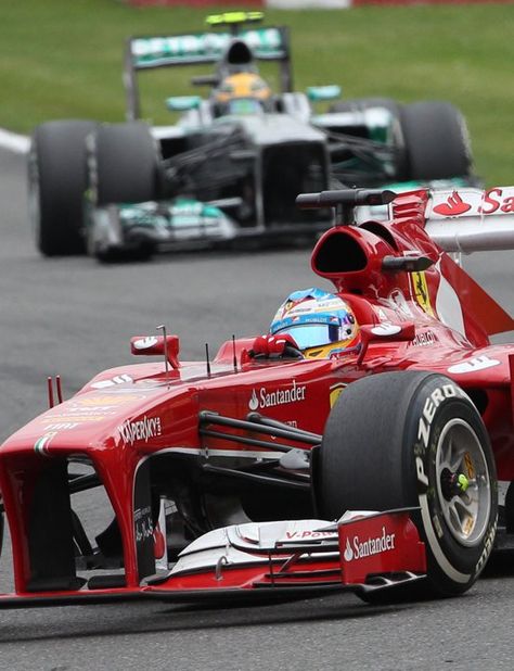 Mercedes AMG driver Lewis Hamilton of Britain, background, chases Ferrari driver Fernando Alonso of Spain during the Belgian Formula One Grand Prix in Spa-Francorchamps, Belgium Hamilton Background, F1 2013, Spa Francorchamps, Amg Mercedes, Formula Drift, Racing Circuit, Racing Photos, 2nd Place, Formula 1 Car