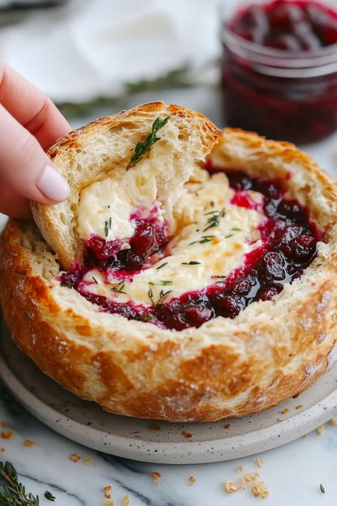 Easy Baked Brie and Cranberry Bread Bowl Baked Brie And Cranberry Bread Bowl, Brie And Sourdough Bread, Ruben Dip In Bread Bowl, Brie Sourdough Bowl, Bread Bowl Cheese Dip Recipes, Bread Bowls Dip, Sourdough Bread Bowl Dip, Baked Brie In Sourdough Bread Bowl, Dips To Go With Sourdough Bread