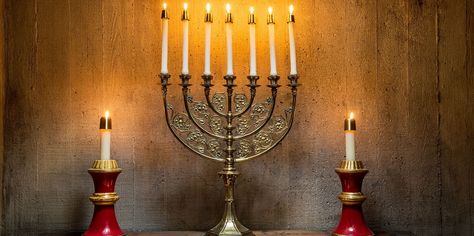 8 Fascinating Facts About Hanukkah - TownandCountrymag.com Festival Of Lights, Fascinating Facts, The Festival, Candle Sconces, Taper Candle, Culture Art, Hanukkah, Fun Facts, Wall Lights