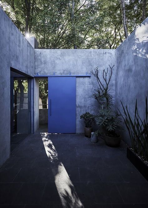 NOSTOS | TANAT; Photo: Sergio López | Archinect Patio Door Shades, Door Shades, Concrete Architecture, Magical Home, Rustic Doors, Patio Interior, Blue Door, Entrance Doors, Patio Doors