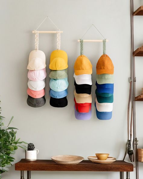 Tired of hats taking over your space? Our new hat organizer is the ultimate cap cavalry! It’s like a personal hat valet, keeping your favorite headwear in line and looking sharp. This stylish solution is the perfect way to transform your closet from chaotic to cool. Explore more at our website BeanDaikon.com or feel free to reach out to us directly! #BeanDaikon #MacrameHanger #HomeDecor #FreshVibes #HomeMade #HomeDecor #InteriorDesign #MacrameLove #HomeDecorIdeas #UniqueGifts #HomeDesignIns... Baseball Theme Room, Cap Rack, Caravan Decor, Cabin Wall Decor, Cap Organizer, Cap Holder, Farmhouse Flair, Cap Display, Christmas Organization