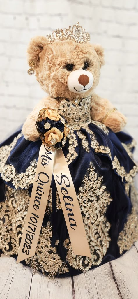 "Custom Personalized Quinceanera Bear/Last Doll/Oso made to look just like the quinceanera's dress. Attention to detail is my forte.  Includes the 20\" bear, dress, tiara, lashes, bouquet and jewelry. Please allow more than 8 weeks to make the bear.  May be longer during peak season.  Please message me with the following information: - Pictures of the front and back of the dress. - Color description as sometimes the pictures may appear differently.  - Date of the Quinceanera - Color of accessori Xv Teddy Bear, Bear Quinceanera Dress, Build A Bear Quinceanera Dress, Quinceanera Maskerade Theme, Quincenera Dresses Navy Blue, Navy Blue Quince Dresses With Gold, Quinceanera Last Teddy Bear, Quinceañera Teddy Bear, Royal Blue And Rose Gold Quinceanera