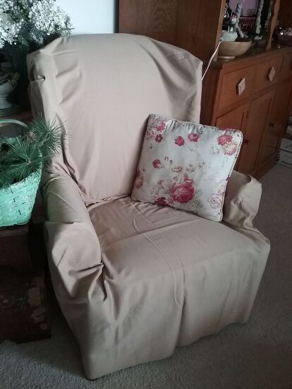 Wingback chairs are very traditional and can adapt to a variety of decorating styles. I wanted to keep these chairs but the hunter green color was a bit (ok, more than a bit) dark for the look I was going for in Florida. If you can't find a ready made slipcover, a very easy no sew slipcover can transform the look of your outdated chair. I went to my stash of material to see if there was anything that would work until I could order exactly what I wanted. I had found a neutral p… Slip Covers For Wing Back Chairs, Ikea Wingback Chair Cover, Wingback Chair Slipcovers Target, No Sew Slipcover, Patterned Wingback Dining Chair Slipcover, Wingback Chair Slipcovers, Queen Anne Wingback Chair, Person Sitting, Mattress Covers