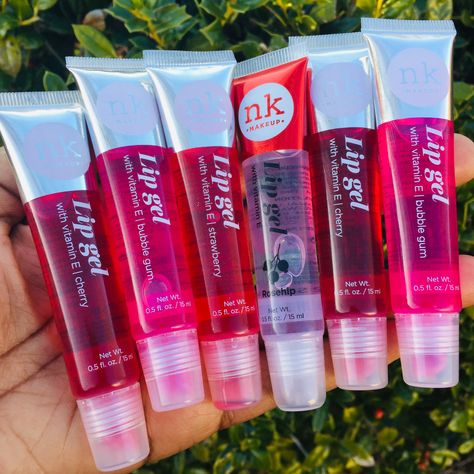 NK Lip Gloss now available. #lipgloss #lipglossfordarkskin #lipglossaddict #glossierlipgloss #glossylips #glitterlips #flavoredlipgloss #lipglosspoppin #pinklips #redlips #lipstick #lipbalm Nk Lip Gloss, Broadway Lip Gloss, Best Lip Glosses, Glossy Lips Makeup, Natural Lip Gloss, Lip Gloss Cosmetics, Lip Gloss Balm, Lip Balm Collection, Best Lip Gloss