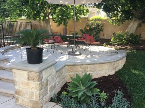 Raised Patio Edging Ideas: 10 Tricks to Edge a Raised Patio! Raised Concrete Deck, Pool Deck Seating, Entrance House Ideas, Patio Edging Ideas, Backyard Storage Ideas, Modern Mediterranean Backyard, Mediterranean Backyard, Patio Edging, Stone Edging