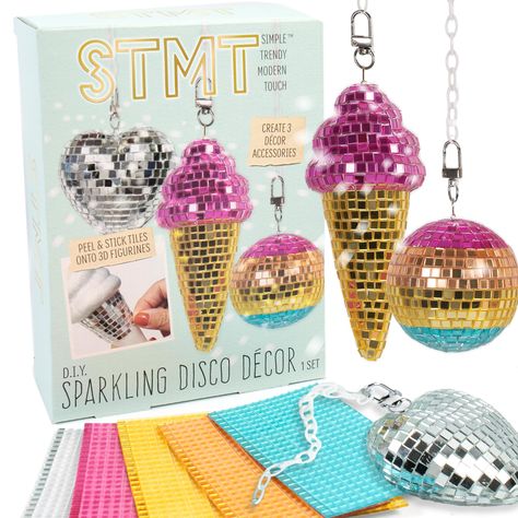 PRICES MAY VARY. GET INTO THE GROOVE: This DIY disco ball decor set comes with everything you need to create 3 shiny accessories in just 5 easy steps! Pick a 3D figurine, design your pattern, peel & stick on mirrored tiles, connect to chains & display! 3 FAR-OUT ACCESSORIES: Turn a lightweight disco ball, ice cream cone, and heart into aesthetic decor or accessories that can hang anywhere and never lose their sparkle! Perfect for display in dorms! 7 SPARKLING, COLORFUL TILE SHEETS: The adhesive Ice Cream Cone Aesthetic, Y2k Party Decorations, Cone Aesthetic, Heart Ice Cream, Shiny Accessories, Mini Disco Ball, Diy Disco Ball, Disco Decor, Disco Ball Decor