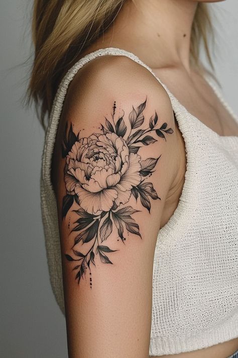 A single peony tattoo with leaves on a woman’s upper arm, featuring soft shading for a natural look. Beautiful Arm Tattoos For Women, Unique Tattoos For Women Arm, Peony Tattoo Shoulder, Beautiful Arm Tattoos, Inside Arm Tattoos For Women, Tattoos For Women Arm, Jeep Tattoo, Inside Of Arm Tattoo, Bird Tattoos For Women