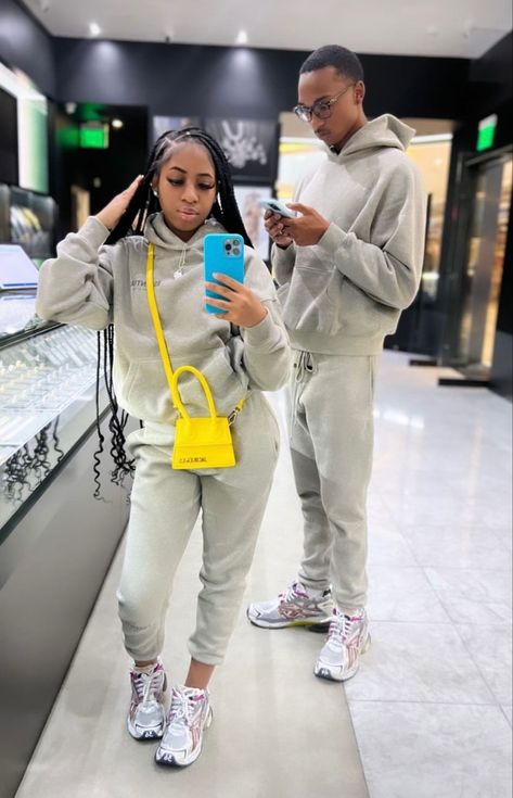 Couple Outfits Matching Black People, Matching Couple Airport Outfits, Matching Couple Track Suits, Matching Designer Outfits Couples, Matching Essentials Hoodie Couple, Nike Matching Set Outfit Couple, Essentials Matching Couple, Black Couple Outfit Ideas, Black Couples Matching Outfits Fall