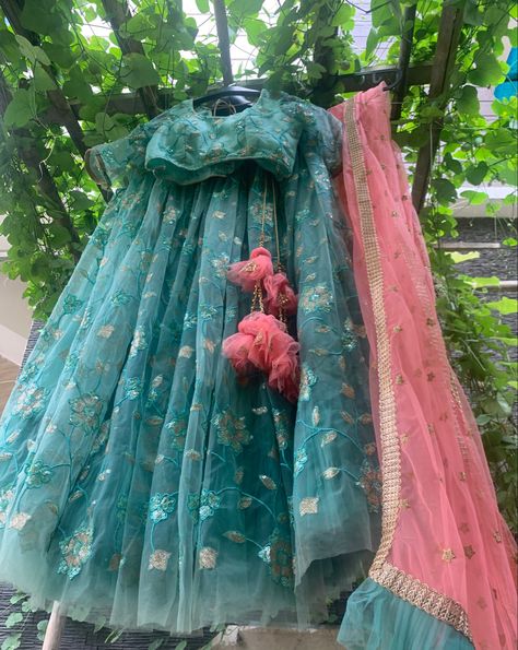 Look spectacular for the next occasion in a stunning sea blue Heavy flared lehenga and crop top paired with a pink dupatta. DM for more details! #prathyusha#prathyusha’scloset#blueleheng#floraldesign#heavyflare#pink#dupatta#designerwear#lehenga#weddingseason#bridalcollection#bridiallehenga#indianfashion#trendylehenga#fashionwear Flared Lehenga, Lehenga Crop Top, Pink Dupatta, Blue Lehenga, Long Dress Design, Wonder Quotes, Indian Fashion Dresses, Sea Blue, Dress Design