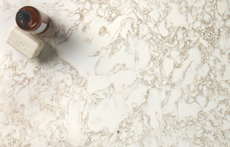 Delicate gold veining swirls in tight and open patterns, creating lighter and darker pools of color. This elegant warm design glistens.... Cambria Hermitage, Affordable Countertops, Cambria Countertops, Countertop Design, Quartz Countertop, Quartz Colors, Kitchen Remodel Idea, Quartz Countertops, Clear Water