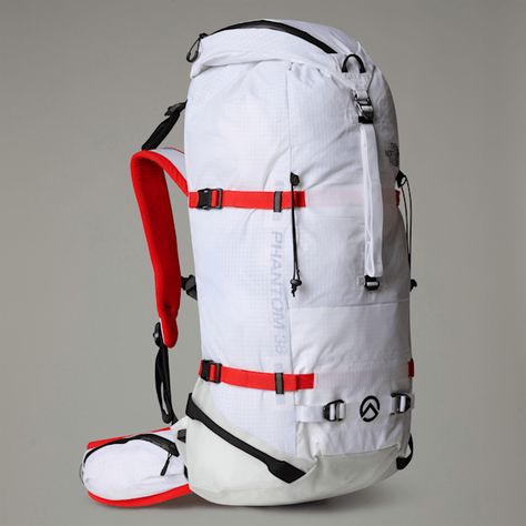 Ultra-light 38-litre backpack for mountain sports and ski touring Roomy fit: This bag offers plenty of room for essentials and everyday belongings. Ski mountaineers, we've got your back. The updated Phantom 38 is the closest you'll get to pack perfection. It carries a lot without weighing you down (it's less than a kilo) thanks to the ultra-light but reliably durable Spectra® ripstop fabrication. The top lid has been removed to reduce weight, but the flip top still has a small, zipped pocket for stashing your essentials and a cord to cinching or securing a rope. The side compression straps carry skis or a split board and the reinforced hip belt means load bearing isn't uncomfortable. The tool carrying system has been enhanced to better cover sharp and pointy gear and thanks to internally r Trail Running Training, Fabric Boots, Mountain Sports, Ski Touring, Casual Running Shoes, Got Your Back, Walking Boots, Hiking Backpack, Reduce Weight