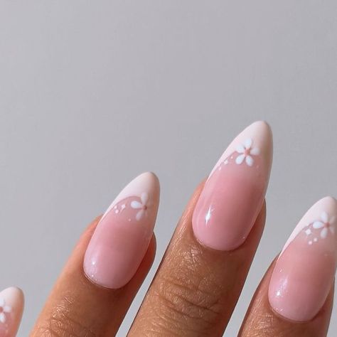 pearlie pressed | nail artist | content creator on Instagram: "vanilla french tip flower nails 🍨 - what do you think?  gel polish | @modelones @modelonesrealm   [nail inspo, short nail inspo, almond nail inspo, summer nail inspo, white nail inspo, nail inspo simple, french nail inspo, french tip, french tip nails, french tip designs, french tip inspo, french tip manicure, french tip almond, flower nail design, flower nails, white flower nails, summer flower nails, cute nail designs, short cute nail inspo, cute nail ideas, cute simple nails, cute almond nails, cute gel nails trendy nails]  #modelones #nailinspo #nailinspiration #nailideas #nailart #naildesign #flowernails #flowernailart #flowernail #flowernaildesign #whiteflowernails #vanillafrenchnails #frenchtipnails #frenchtipsnails #fr White French Tip Nails With Simple Design, Cute Nail Designs French Tip Almond, French Nails With Pattern, Nails Acrylic White Flowers, Almond French Tip Nails Flowers, French Tip Gel X Nails Almond, Short Almond Nails With French Tip, Nail Inspo Trendy French Tip, Short French Tip Nails With Flowers