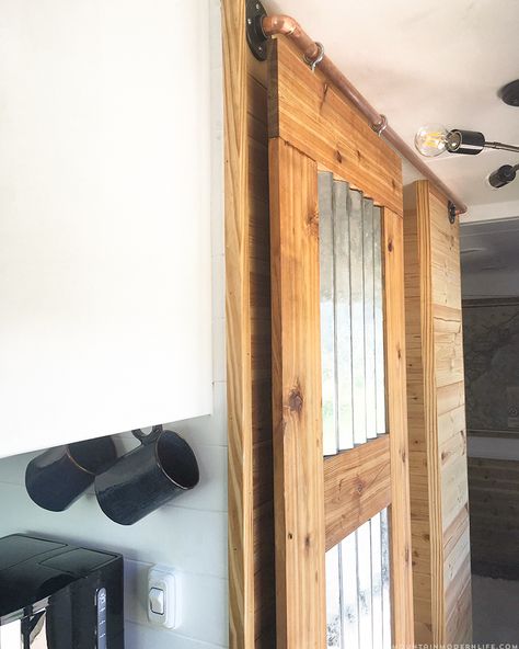 Door On Wheels, Rv Bathroom Door Ideas, Small Barn Door For Cabinet, Barn Doors Sliding Cabinet Hardware, Bathroom Sliding Door, Pole Barn Sliding Door Track, Barn Door Track System, Diy Sliding Door, Barn Door Track