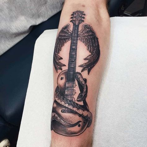 #Tattoos,guitar tattoo Tattoos Guitar, Guitar Tattoos, Acoustic Guitar Tattoo, Tattoo Sleeve Ideas, Guitar Tattoo Design, Western Tattoos, Guitar Tattoo, Music Tattoo Designs, Petite Tattoos