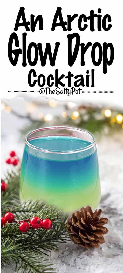 This beautiful Arctic Glow Drop cocktail is layered with tropical pineapple and blue curaçao for a unique, wintry look! Perfect for parties, holidays, or any time you want a colorful and refreshing drink. Pin this easy, impressive cocktail recipe! Crockpot Snacks, Iced Coffee Concentrate, Blue Curacao Drinks, Layered Drinks, Spiced Drinks, Raspberry Syrup, Blue Food Coloring, Lemon Lime Soda, Vodka Drinks