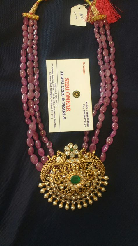 Polki gold locket & ruby beads mala Ruby Beads Jewellery Indian, Ruby Beads Jewellery, Ruby Beads Mala, Ruby Haram, Henna Candle, Indian Gold Necklace Designs, Vaddanam Designs, Emerald Jewellery, Indian Choker Necklace