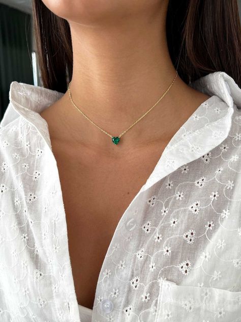 Emerald Choker Necklace, Tiny Emerald Heart Pendant 14k Gold, Green Emerald Heart Charm Necklace, Sterling silver 925 solitaire Necklace The perfect layering piece or minimalist necklace. This necklace is perfect to wear as everyday jewelry and combined layered with other necklaces. Hypoallergenic, lightweight and minimalist. ► FEATURES: * Sterling silver 925 * Emerald Green cubic zirconia 8 mm ► MEASUREMENT : Chain length: 13" / 33 cm  Stone size: 8mm In addition you will receive an extender ch Emerald Choker, Emerald Green Necklace, Heart Charm Necklace, Solitaire Necklace, Solitaire Necklaces, Emerald Necklace, Charm Pendant Necklace, Green Necklace, Green Emerald