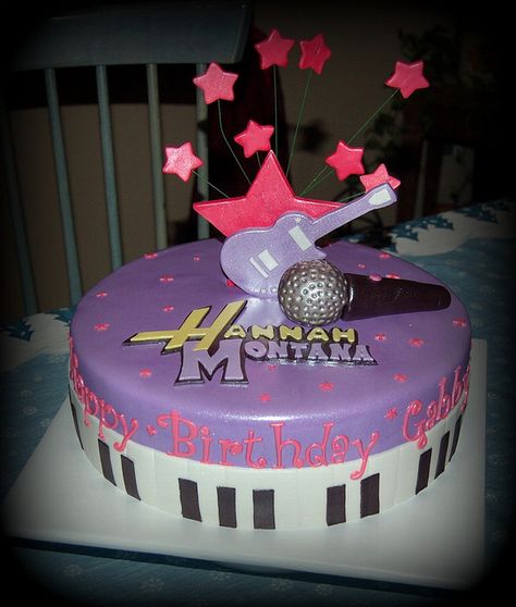 hannah montana cake (Andrea feb 25) Hannah Montana Birthday Cake, Hannah Montana Birthday, Music Themed Cakes, Rockstar Party, Marvel Cake, Cheerleading Bows, Rock Star Party, Feb 25, Crazy Cakes