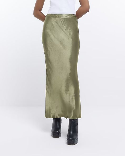 Khaki satin maxi skirt | River Island (UK & IE) Satin Maxi Skirt, Mid Skirt, Leather Midi Skirt, Satin Midi Skirt, Black Leather Skirts, Detailed Sweater, Satin Maxi, Evening Outfits, Black Midi Skirt