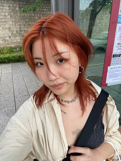 Shadow Root Orange Hair, Dyed Hair Orange Brown, Orange Hair On Tan Skin, Reddish Orange Hair, Ginger Hair Short Bangs, Orange Hair Asian, Orange Bangs Brown Hair, Japanese Orange Hair, Alt Copper Hair