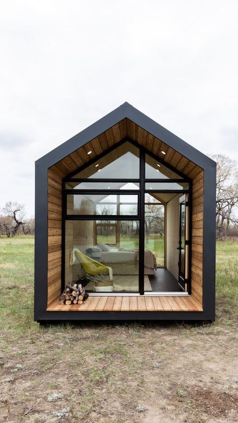 This prefab cabin's steel siding and cedar deck is what you need to stay off the grid. Cabin Decor Ideas, Glass Cabin, Chalet Design, Prefab Cabins, Cabin House, Tiny Cabins, Modern Tiny House, Tiny Cabin, A Frame House