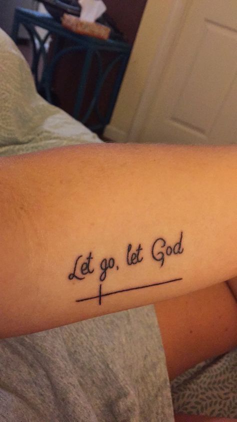 #LetgoletGod #tattoo Finding God Tattoo, Let Go Let God Tattoos For Women, Christian Shoulder Tattoos For Women, Simple Faith Based Tattoos, Let Go Let God Tattoo Ideas, Let Go And Let God Tattoo Ideas, God Is Higher Than The Highs And Lows Tattoo, Let God Tattoo, Live In The Moment Tattoo