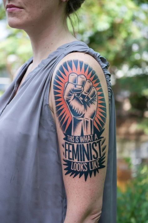 Tattoo on upper arm depicting a raised fist with the text "This is what a feminist looks like". Kindness Tattoo, Feminist Tattoos, Feminist Tattoo, Girl Power Tattoo, Venus Symbol, Powerful Symbols, Power Tattoo, Power Of Women, Feminist Icons