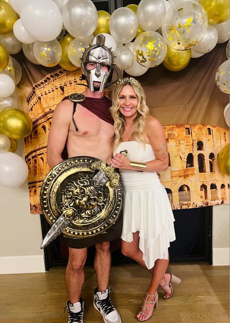 Ancient Rome party! Fun Halloween costume idea for couples. #halloween #costume #couplescostume #gladiator #rome Follow my shop @styleduplicated on the @shop.LTK app to shop this post and get my exclusive app-only content! #liketkit #LTKSeasonal #LTKparties #LTKFind @shop.ltk https://liketk.it/4hrx3 Spartan Couple Costume, Spartan Halloween Costumes, Gladiator Couple Costume, Ancient Rome Party, Gladiator Halloween Costume, Roman Goddess Costume, Goddess Costume Halloween, Gladiator Party, Rome Party