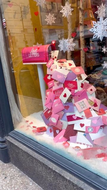 P.O.S.H. Chicago on Instagram: "We’re nothing if not happy fools in love!💘  It may be frigid cold outside, but our current shop windows are sure to warm your heart as they celebrate the most romantic day of the year…just one month away, it’s Valentine’s Day!  : : : #poshchicagoshop #valentines #valentinesday #loveletters #youvegotmail #shopdisplay #shopwindows #whydofoolsfallinlove #bemine #💘" Valentines Window Display, Gift Shop Interiors, Flower Shop Decor, Holiday Window Display, Brand Photography Inspiration, Alternative Christmas Tree, Shop Windows, Valentine Theme, Not Happy