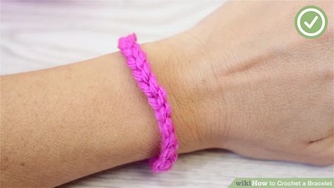 3 Ways to Crochet a Bracelet - wikiHow Crochet A Bracelet, Crochet Start, Fast Crochet, Front Post Double Crochet, Beginner Crochet Projects, Beginner Crochet, Crochet Bracelet, Crochet Round, A Bracelet