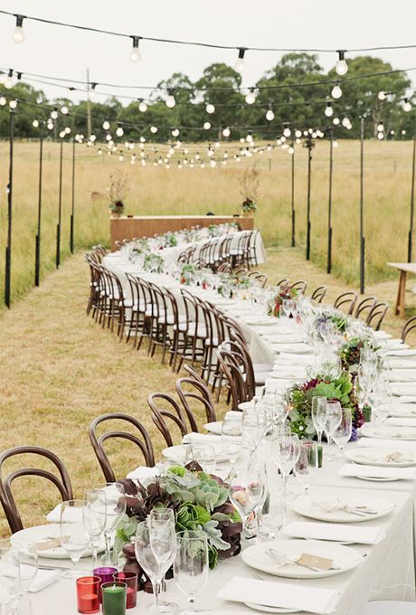 Long Banquet Wedding Tables: White Tablecoth and Dramatic Succulents  | Brides.com Wedding Reception Seating, Beautiful Wedding Reception, Deco Champetre, Field Wedding, Rustic Wedding Reception, Table Layout, Outdoor Dinner, Reception Seating, Outdoor Wedding Reception