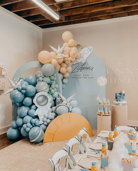 This party needed it’s own static spot on my feed! I loved how everything turned out. 🚀☀️ 📸: @melissamendezphotography 🏡:… | Instagram Boy Baby Shower Decoration Ideas, Space 1st Birthday Photoshoot, Space Birthday Party Backdrops, Theme Birthday Party For Boys, Outdoor Kids Birthday Party, Space Themed Birthday Party Balloons, First Trip Around The Sun Balloon Decor, First Trip Around The Sun Birthday Party Balloons, Baby Boy Birthday Party Ideas