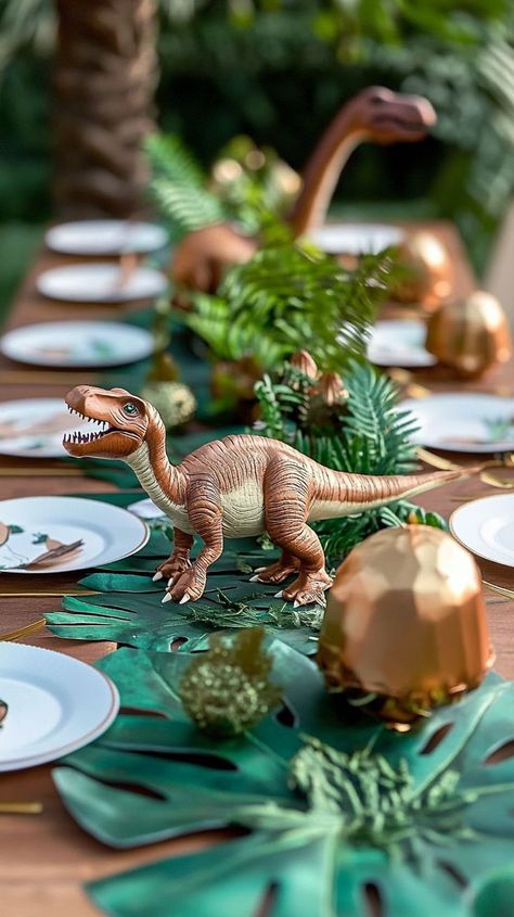 Plan the ultimate dino-mite birthday with these Jurassic-inspired tips! Explore fun games, unique decorations, and mouth-watering themed treats to bring a dinosaur world to life in your backyard. Prehistoric Activities, Dinosaur Party Centerpiece, 4th Birthday Party For Boys, Dinasour Birthday, Dinosaur Party Food, Baby Dinosaur Party, 3rd Birthday Party For Boy, Dinosaur Birthday Party Ideas, Dino Dig