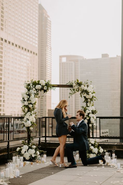 Chicago Rooftop Proposal Flowers and Candles Rooftop Engagement Party, Proposal Places, White Proposal, Social Table, Proposal Aesthetic, Wedding Proposal Ideas Engagement, Arch Ways, Savannah Elopement, Rooftop Proposal