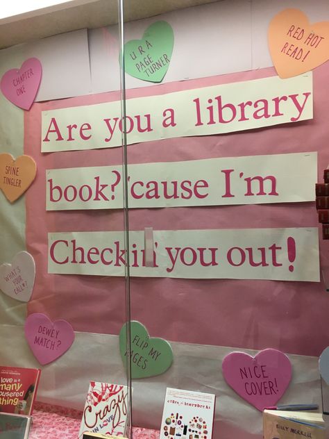 Valentine Library Ideas, Library Book Drop Decoration, Valentines Book Display, January Library Displays, Valentines High School, February Library Bulletin Boards, Valentine Library Bulletin Board Ideas, Romance Book Display Library, Valentines Library