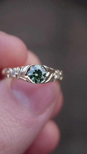 Andrew Ashcroft on Instagram: "Green diamond in hand engraved gold. Each one is unique and made to order. DM for quotes." Luxury Green Engraved Ring, Elegant Green Gemstone Engraved Ring, Green Engraved Ring Jewelry, Elegant Green Engraved Rings, Vintage Engraved Emerald Ring, Blair Wedding, Cute Engagement Rings, Green Diamond, Hand Engraving