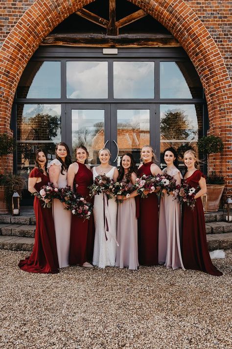 Bridal party wearing mismatched bridesmaid dresses in blush pink and burgundy red shades for autumnal wedding at Wasing Park with bride in fitted wedding dress holding matching bouquets | wedding flowers | wedding bouquets | bridesmaid dress ideas | country house wedding | Jessica Grace Photography Mismatched Burgundy Bridesmaid Dresses, Burgandy Bridesmaids Dress, Dark Red Bridesmaid Dresses, Pink And Burgundy Wedding, Wasing Park, Blush Pink Bridesmaid Dresses, Gorgeous Bridesmaid Dresses, Wedding Color Pallet, Country House Wedding