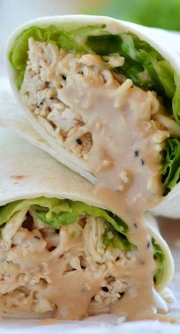 Crock Pot Chicken Caesar Wraps ~ Flavorful Caesar chicken, lettuce and Parmesan cheese wrapped inside a flour tortilla. Sandwich Vegetarian, Chicken Caesar Wrap, Caesar Chicken, Flour Tortilla, Chicken Caesar, Crock Pot Chicken, Carb Foods, Think Food, Crock Pot Slow Cooker