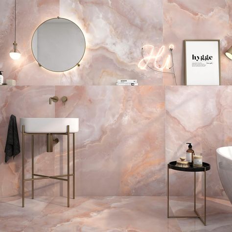 Introducing: Alaska 🌸 Discover the beauty of Alaska’s onyx effect tiles and indulge in a world of elegance. The stunning coral, rose, and blush tones create a romantic ambiance, while the super polished finish adds a touch of glamour! #tilestyle #tileinspiration #marble #homedecor #sophisticatedspaces #marblebathroom #bathroomdecor #homeinspiration #onyx #onyxtile #elegantspaces Onyx Tile Bathroom, Vogue Pink, Pink Tile Bathroom, Pink Bathroom Tiles, Onyx Tile, Luxury Bathroom Tiles, Quartz Tiles, Polished Porcelain Tiles, Tile Trends