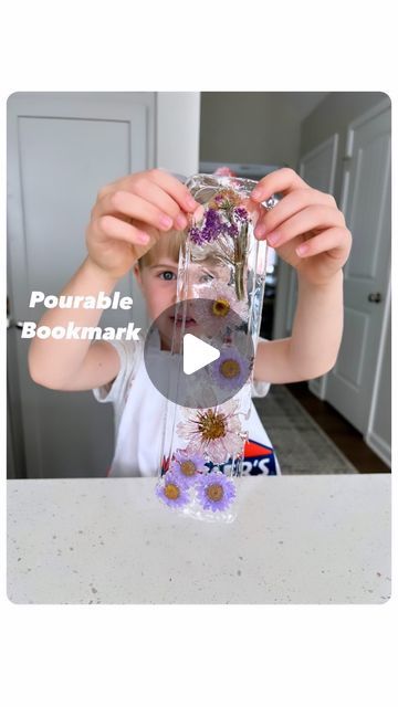 Rozanne | Bright Little Brains on Instagram: "SAVE to try!  Here’s another FUN @elmersproducts activity that your little one will love- Pourable Bookmark! 🙌🏻  ❗️Remember to check out Elmer’s online Inspo-hub; Elmer’s Creations for more arts and craft ideas! - Link in stories!   Materials used:  👉🏼 1 bottle Elmer’s Clear School Glue  👉🏼 Rectangular container 👉🏼 Embellishments  (We made use of pressed flowers) 👉🏼 Hole puncher 👉🏼 Scissors  👉🏼 Ribbon/String  Instructions:  1. Add a layer of Elmer’s Clear School glue to the surface of the rectangular container.  2. Add your embellishments (glitter/flowers)  3. Press it lightly into the glue.  4. Pour another thin layer of glue over.  5. Let it dry overnight.  6. Once dried, you can gently remove the dried glue from the container. Elmers Clear Glue Crafts, Glue Bookmarks, Clear Glue Crafts, Glitter Glue Crafts, Bookmarks Diy Kids, Grandkid Crafts, Arts And Craft Ideas, Girls Crafts, Alzheimers Activities