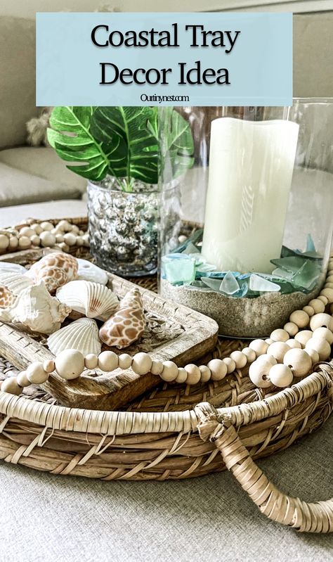 Summer vignette or tray decor idea for coastal beach decor Coffee Table Coastal Decor, Coastal Kitchen Island Decor, Coastal Tray Decor Ideas, Summer Tray Decor Ideas, Neutral Beach Decor, Coastal Coffee Table Decor Ideas, Coastal Table Centerpiece, Dark Coastal Decor, Coastal Coffee Table Decor