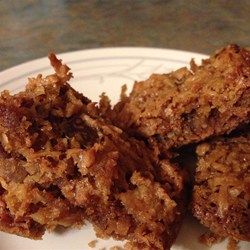 Tom Thumb Bars  (Coconut Specialties) - Allrecipes.com Coconut Chocolate Bars, Work Recipes, Banana Bread Cookies, Coconut Slice, Almond Cake Recipe, Bread Cookies, Coconut Candy, Coconut Bars, Honey Almonds