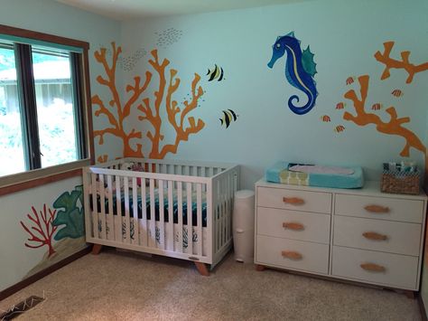 Coral reef nursery Reef Nursery, Coral Reef Nursery Theme, Coral Reef Bedroom, Under The Sea Baby Girl Nursery Ocean Themes, Finding Nemo Nursery, Underwater Nursery Theme Girl, Nemo Nursery, Project Nursery Girl, Coral Reef Wall Decal