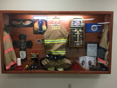 Shadow box made for a fallen firefighter in my department Firefighter Display, Firebox Ideas, Firefighter Man Cave, Fire Department Decor, Fire Decor, Fire Truck Room, Firefighter Room, Fire Theme, Firefighter Crafts