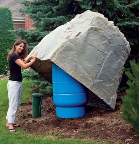 Now this is a big fake rock!  You could hide a king sized geocache here. Fake Rock Covers, Well Pressure Tank, Pool Equipment Cover, Artificial Rocks, Fake Rock, Faux Rock, Cement Garden, Rock Cover, Landscape Stone