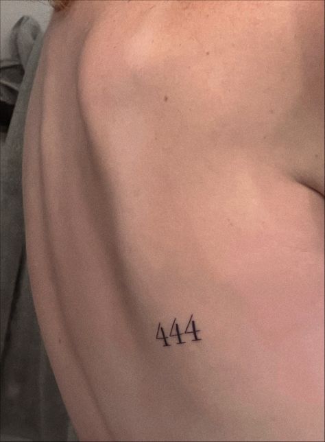 tattoo on lower back that reads “444” 444 Tattoo Ankle, Angel Number Tattoo Ideas 444, 444 Tattoo Ideas Neck, Angel Number 444 Tattoo Font, 4:44 Tattoo Ideas, 444 Tattoo Hip, 444 Rib Tattoo, 44 Tattoo Number, 444 Ankle Tattoo