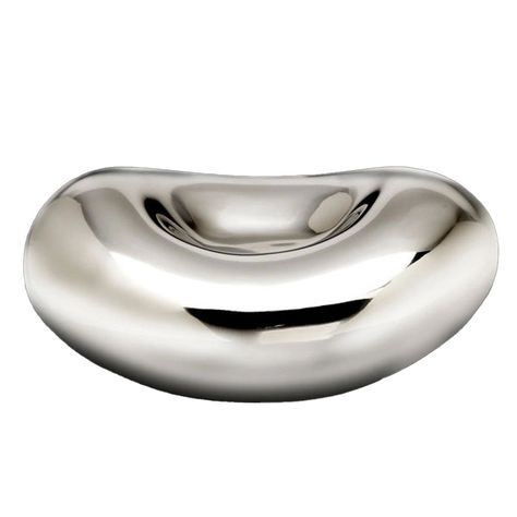 This cool bean-shaped sculptural bowl feels good in the hand and adds a modern pop to any table or shelf. Handcrafted of food-safe polished aluminum. Larger version also available. Bean Bowl, Winter Chalet, Mouth Freshener, Girl Apartment, Ring Bowl, Silver Bowl, Glass Tray, Neon Party, Museum Of Contemporary Art