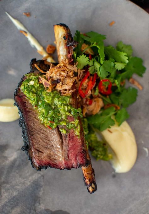 smoked short ribs, silky smooth cauliflower puree and spicy cilantro chimichurri - if this sounds like your thing then get clicking!! #shortribs #beefribs #smokedshortribs #chimichurri @another_food_blogger Smoked Short Ribs, Smoked Beef Short Ribs, Gastronomic Food, Cilantro Chimichurri, Smoked Beef Ribs, Gourmet Food Plating, Cauliflower Puree, Spring Menu, Bistro Food