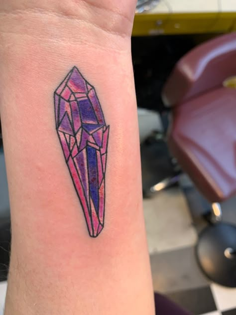 Tattoo idea of a purple, white, pink and blue “Dark Crystal” gem from the Jim Henson movie “The Dark Crystal”. The life essence... Kyber Crystal Tattoo, Jim Henson Tattoo, The Dark Crystal Tattoo, Dark Crystal Tattoo, Tatu Ideas, Crystal Tattoos, Tattoo Collage, Tat Inspiration, Tim Burton Tattoo