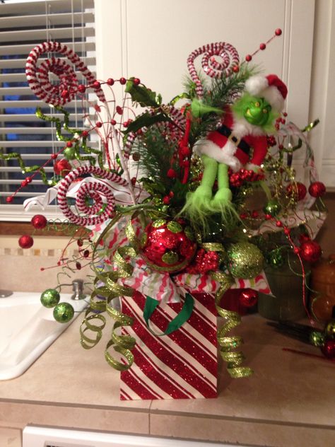 Whoville Centerpiece Whoville Table Centerpieces, Grinch Theme Centerpieces, Easy Grinch Centerpieces, Grinch Table Decorations Christmas Centerpieces, Diy Grinch Table Centerpiece, Grench Who Stole Christmas Centerpieces For Table, Styrofoam Diy, Grinch Table, Whoville Decorations